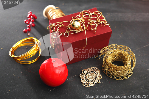 Image of Things you need to pack gifts Woman packs gifts, step by step Woman packs Christmas gift