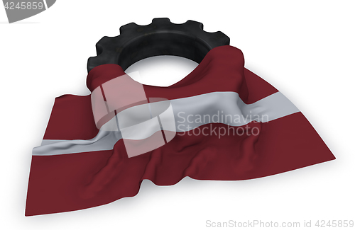 Image of gear wheel and flag of latvia - 3d rendering