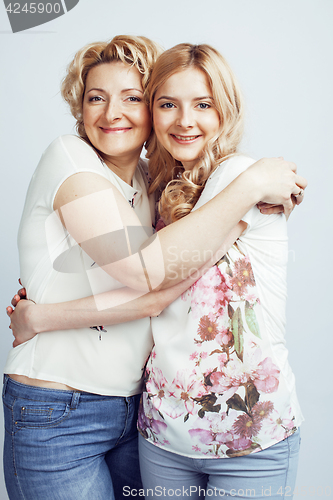 Image of mother with daughter together posing happy smiling isolated on white background with copyspace, lifestyle people concept closeup