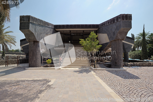 Image of Modern Memorial over old octagonal church