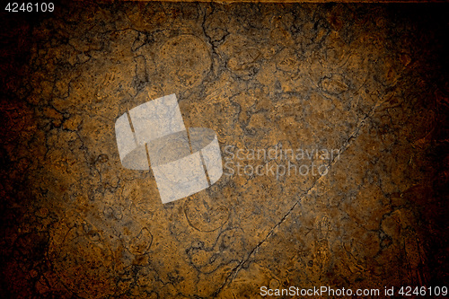Image of Vignetted stone wall background with lots of texture