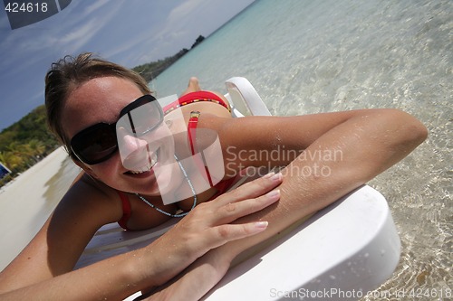 Image of Smiling Woman on Tropical Beach