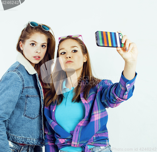 Image of best friends teenage girls together having fun, posing emotional on white background, besties happy smiling, lifestyle people concept close up