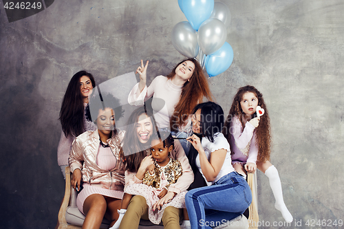 Image of Lifestyle and people concept: young pretty diversity nations woman with different age children celebrating on birth day party together happy smiling, making selfie. African-american, asian and caucasi