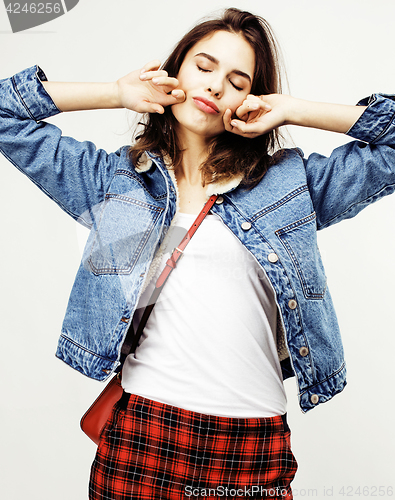 Image of young pretty teenage hipster girl posing emotional happy smiling on white background, lifestyle people concept closeup