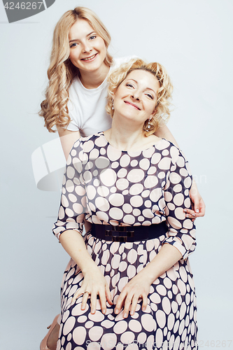 Image of mother with daughter together posing happy smiling isolated on white background with copyspace, lifestyle people concept closeup