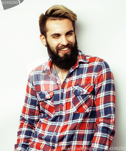 Image of portrait of young bearded hipster guy smiling on white background close up, brutal modern man
