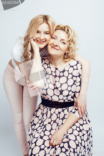 Image of mother with daughter together posing happy smiling isolated on white background with copyspace, lifestyle people concept closeup