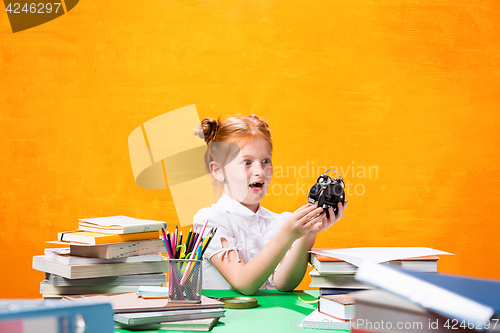 Image of Teen girl with lot of books