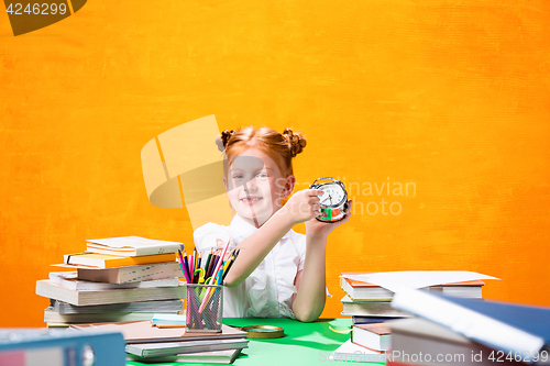 Image of Teen girl with lot of books
