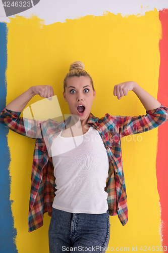 Image of young woman over color background