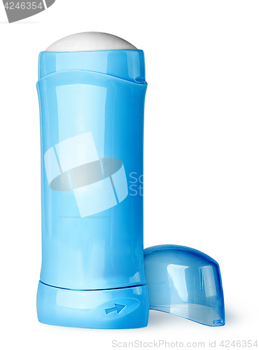 Image of Blue deodorant container cap behind