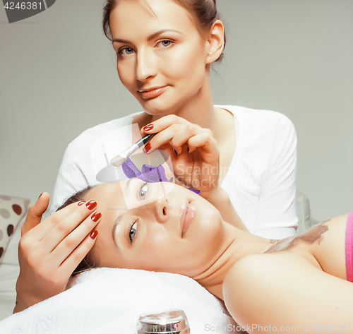 Image of stock photo attractive lady getting spa treatment in salon, healthcare people concept 