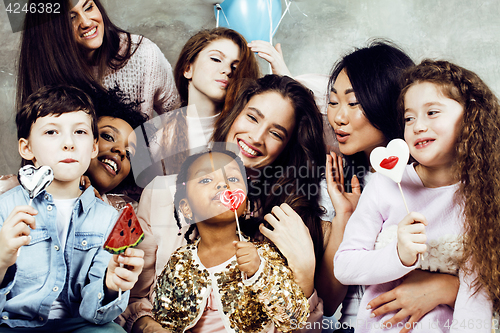 Image of Lifestyle and people concept: young pretty diversity nations woman with different age children celebrating on birth day party together happy smiling, making selfie. African-american, asian and caucasi