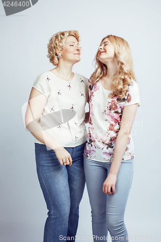 Image of mother with daughter together posing happy smiling isolated on white background with copyspace, lifestyle people concept closeup