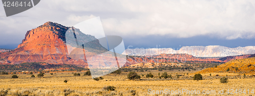 Image of Storm Brewing Sun Hits Red Rock Walls Grand Staircase-Escalante 