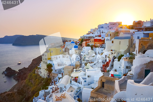 Image of Oia village on Santorini in sunset, Greece.