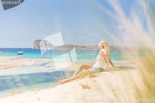 Image of Relaxed Happy Woman Enjoying Sun on Vacations.