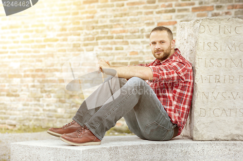 Image of man standing outside