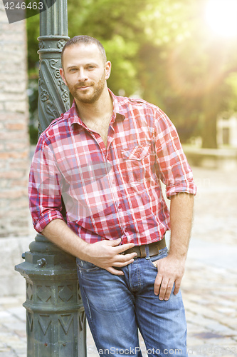 Image of man standing outside