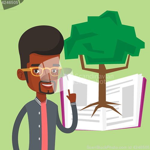 Image of Student pointing at tree of knowledge.