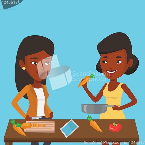 Image of Women cooking healthy vegetable meal.
