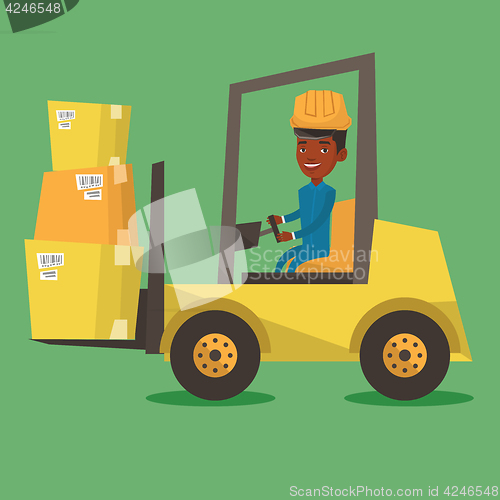 Image of Warehouse worker moving load by forklift truck.