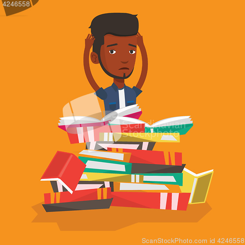 Image of Student sitting in huge pile of books.