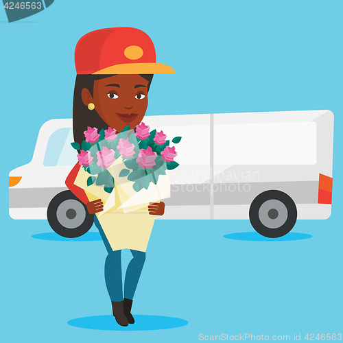 Image of Delivery courier holding bouquet of flowers.