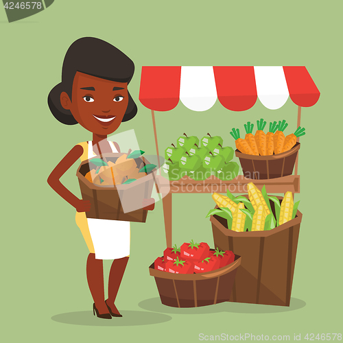 Image of Street seller with fruits and vegetables.