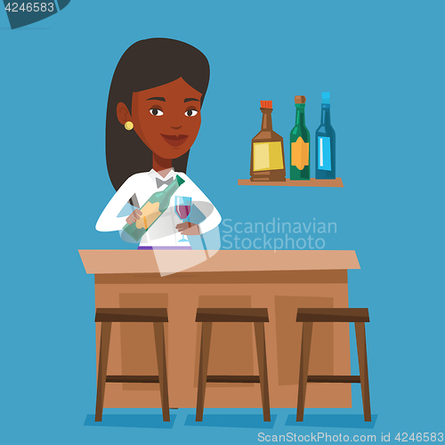 Image of Bartender standing at the bar counter.