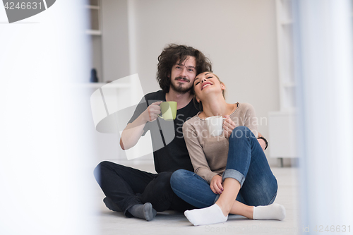 Image of young couple in their new home