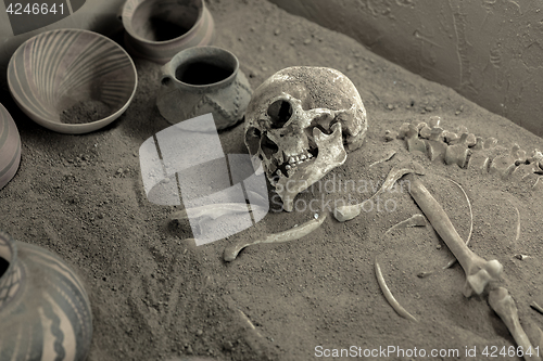 Image of Aged skeleton with pots