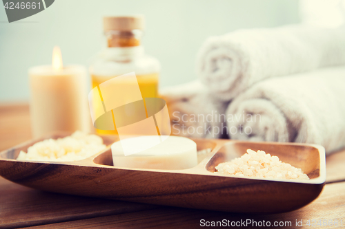 Image of close up of soap, himalayan salt and scrub in bowl