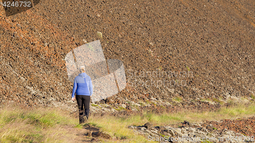 Image of Shot of a young woman hiking in Iceland