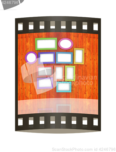 Image of Mock up picture frames on wood wall. 3d illustration. The film s