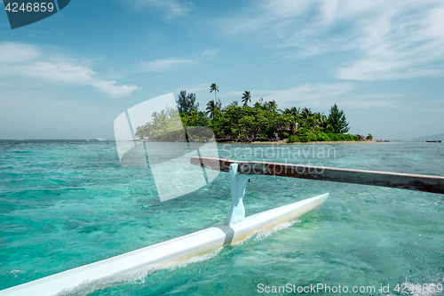 Image of Pirogue on the way to paradise tropical atoll in Moorea Island l