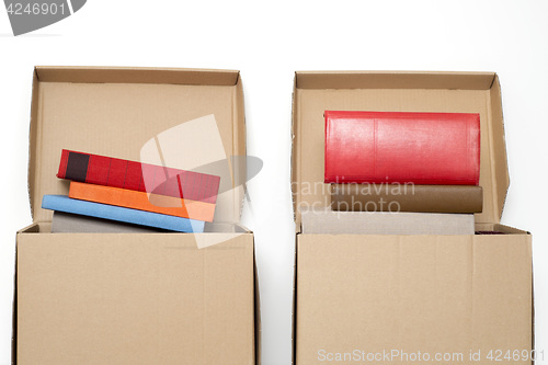 Image of cardboard boxes full of books