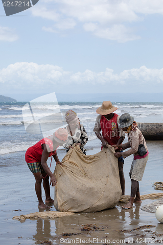 Image of Native Malagasy fishermen fishing on sea, Madagascar