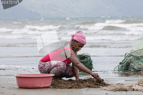 Image of Native Malagasy fishermen fishing on sea, Madagascar