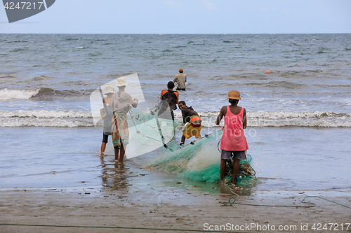 Image of Native Malagasy fishermen fishing on sea, Madagascar