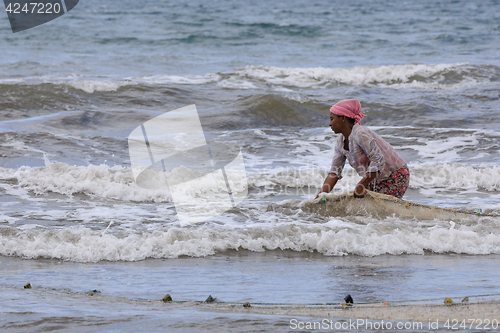 Image of Native Malagasy fishermen fishing on sea, Madagascar