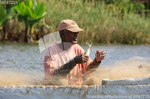 Image of Fisherman life in madagascar countryside on river