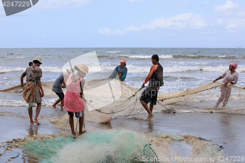 Image of Native Malagasy fishermen fishing on sea, Madagascar