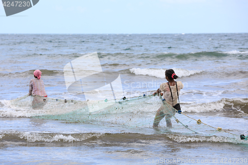 Image of Native Malagasy fishermen fishing on sea, Madagascar