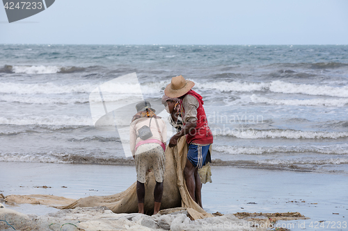 Image of Native Malagasy fishermen fishing on sea, Madagascar