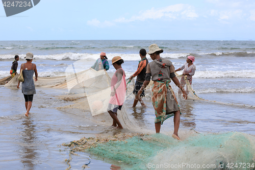 Image of Native Malagasy fishermen fishing on sea, Madagascar