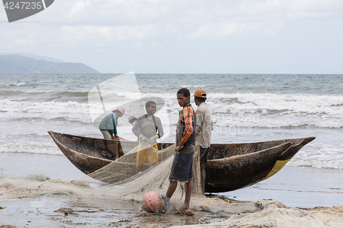 Image of Native Malagasy fishermen fishing on sea, Madagascar