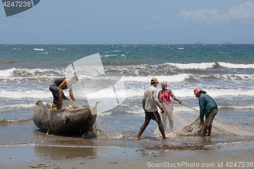 Image of Native Malagasy fishermen fishing on sea, Madagascar