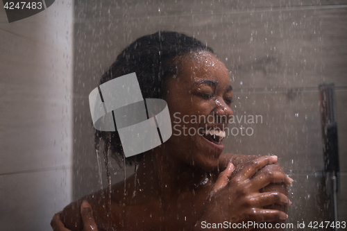 Image of African American woman in the shower